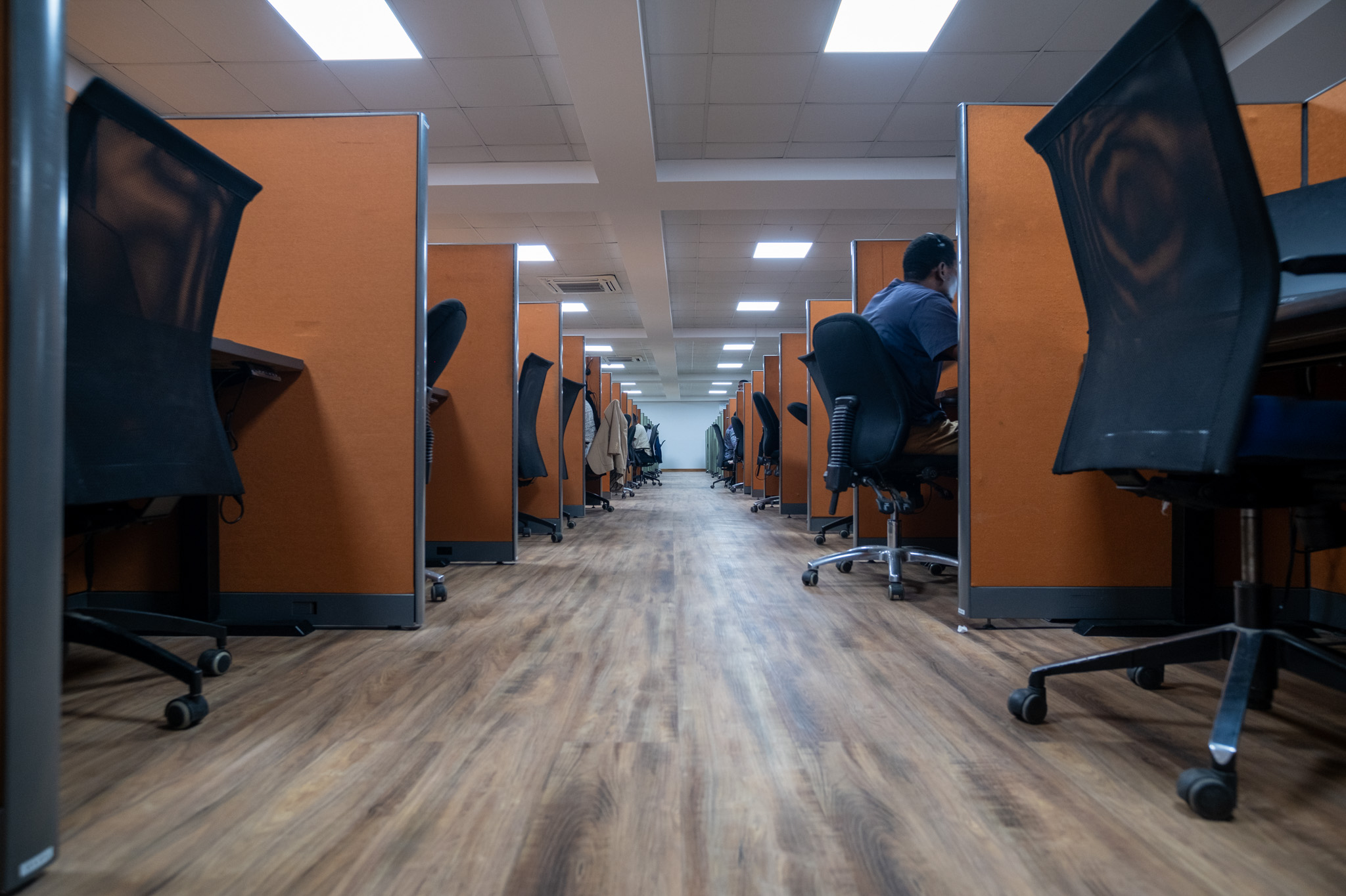 Contact center floor with agents at workstations